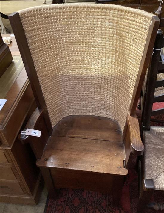 An early 20th century oak Orkney chair, width 59cm depth 41cm height 106cm